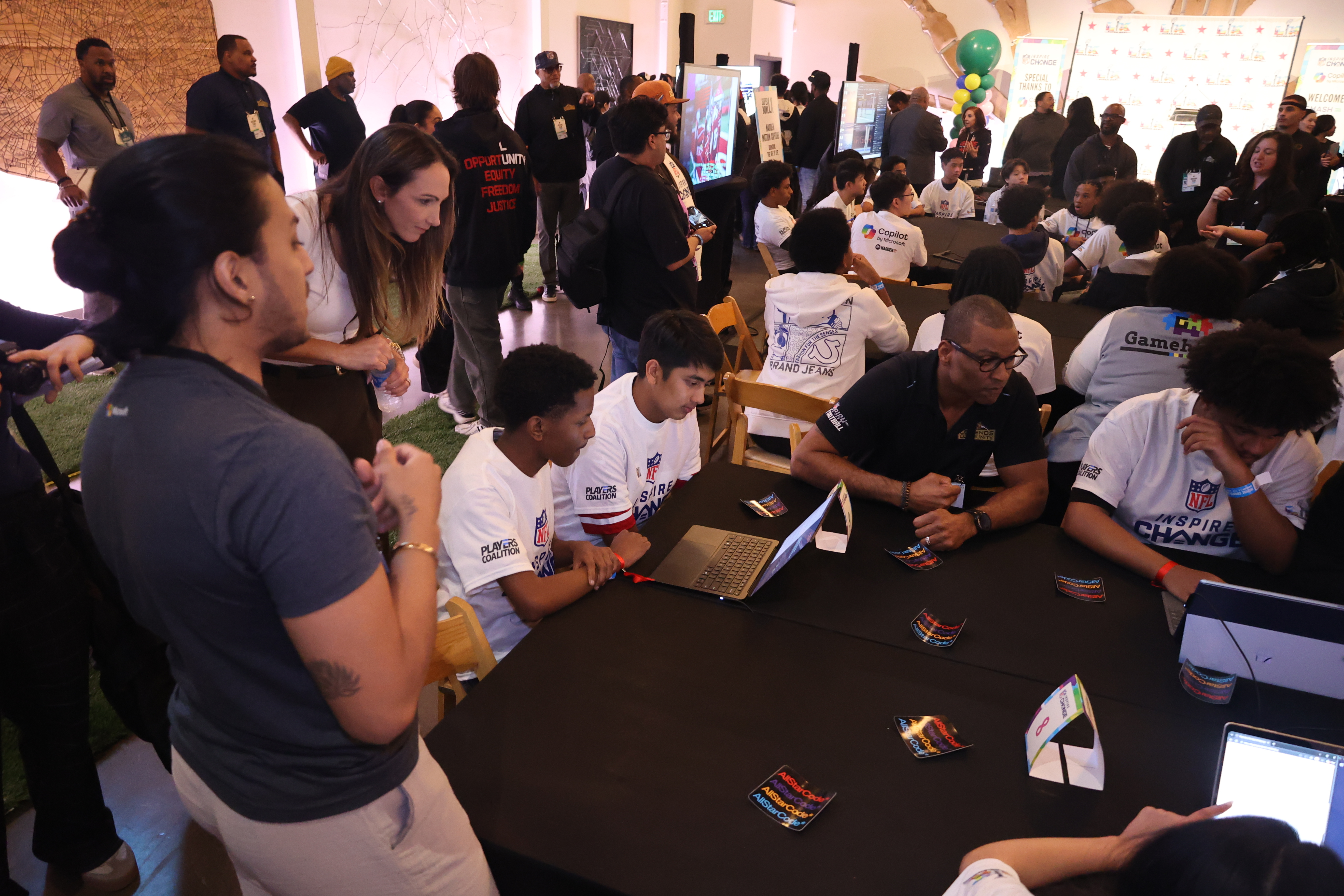 Navid teaching an AI hackathon sponsored by Microsoft Copilot at the NFL Inspire Change event