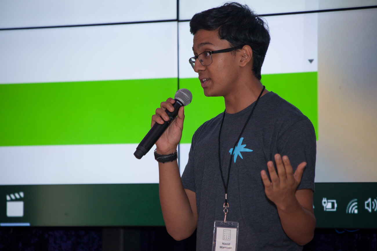 Navid speaking as a teenager at All Star Code Demo Day in 2016
